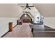 Bonus room with ping pong table, seating, and work out equipment at 401 Sara Ct, Loganville, GA 30052
