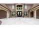 Beautiful brick home featuring arched doorways, a balcony, a well-maintained yard, and a spacious driveway at 401 Sara Ct, Loganville, GA 30052