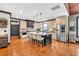 Beautiful kitchen with custom cabinets, granite countertops, an island with barstool seating, and stainless steel appliances at 401 Sara Ct, Loganville, GA 30052