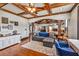 Stylish open-concept living room connected to a bedroom, featuring custom built-ins at 401 Sara Ct, Loganville, GA 30052