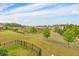 A lush green backyard, landscaped with beautiful lawns, and a path for walking at 6304 Brookwater Vw, Mableton, GA 30126