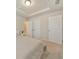 Bedroom featuring plush carpet and a double-door closet at 6304 Brookwater Vw, Mableton, GA 30126