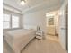 Cozy bedroom with neutral tones and an ensuite bathroom at 6304 Brookwater Vw, Mableton, GA 30126