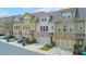 Beautiful townhome exteriors with brick accents, garages, and well-maintained landscaping, offering curb appeal and functionality at 6304 Brookwater Vw, Mableton, GA 30126
