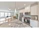 Modern kitchen featuring stainless steel appliances, granite countertops, and an open concept design at 6304 Brookwater Vw, Mableton, GA 30126