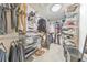 Walk-in closet with custom shelving for optimal storage at 6304 Brookwater Vw, Mableton, GA 30126