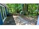 Backyard featuring patio and wooded area at 685 Greenhedge Dr, Stone Mountain, GA 30088