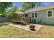 Spacious backyard with a wooden deck, patio, and grilling area, perfect for outdoor entertaining and relaxation at 1659 Beecher Sw St, Atlanta, GA 30310