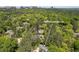 Aerial view of a home nestled among the trees; address is 4067 Randall Farm Rd at 4067 Randall Farm Se Rd, Atlanta, GA 30339
