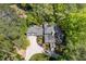 Aerial view of a spacious home surrounded by a dense forest at 4067 Randall Farm Se Rd, Atlanta, GA 30339