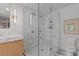 Elegant bathroom features a glass enclosed shower and marble details at 4067 Randall Farm Se Rd, Atlanta, GA 30339
