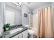 Bathroom with shower and granite countertops at 823 Langley View Ct, Loganville, GA 30052