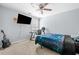 Bedroom with ceiling fan and desk at 823 Langley View Ct, Loganville, GA 30052
