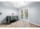 Bright breakfast nook featuring french doors and natural light at 823 Langley View Ct, Loganville, GA 30052