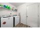Bright laundry room with washer and dryer at 823 Langley View Ct, Loganville, GA 30052