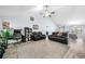 Spacious living area with open layout, comfortable furniture, and modern decor at 823 Langley View Ct, Loganville, GA 30052