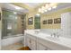 Dual sink bathroom with large mirror, bath tub, shower, and neutral colored walls at 11060 Pennbrooke Xing, Johns Creek, GA 30097