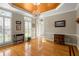 Bright dining room with natural light, plantation shutters, and hardwood flooring at 11060 Pennbrooke Xing, Johns Creek, GA 30097