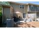 Backyard patio with dining, seating, and cafe lighting at 1396 Dolcetto Nw Trce # 12, Kennesaw, GA 30152
