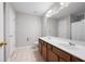 Spacious bathroom offers double sinks, vanity, toilet, and shower/tub combo at 1396 Dolcetto Nw Trce # 12, Kennesaw, GA 30152