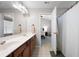 Bright bathroom with double sink vanity, updated fixtures, and a shower/tub at 1396 Dolcetto Nw Trce # 12, Kennesaw, GA 30152