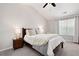 Inviting bedroom with neutral tones, plush bedding, and bright natural light at 1396 Dolcetto Nw Trce # 12, Kennesaw, GA 30152