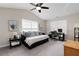 Versatile bedroom with a daybed, desk and plenty of natural light at 1396 Dolcetto Nw Trce # 12, Kennesaw, GA 30152