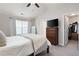Bedroom with vaulted ceilings, a dresser, and a large closet at 1396 Dolcetto Nw Trce # 12, Kennesaw, GA 30152