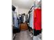 Well-organized walk-in closet with custom shelving and ample storage space at 1396 Dolcetto Nw Trce # 12, Kennesaw, GA 30152