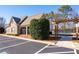 Exterior shot of the community clubhouse with a pool area nearby at 1396 Dolcetto Nw Trce # 12, Kennesaw, GA 30152