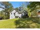 Charming two-story home with a well-maintained lawn and a picturesque wooded backdrop at 257 Browning Cir, Acworth, GA 30101