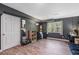 Stylish basement room with a large window, finished flooring, and plenty of potential for a home office or studio at 257 Browning Cir, Acworth, GA 30101