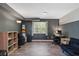 Versatile basement area featuring a large window, finished flooring, and plenty of potential for a home office or studio at 257 Browning Cir, Acworth, GA 30101