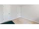 This bedroom has neutral walls, carpet, and two white doors at 257 Browning Cir, Acworth, GA 30101