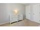 Bedroom has neutral walls, carpet and a white dresser at 257 Browning Cir, Acworth, GA 30101