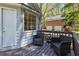 Cozy outdoor deck with comfortable seating, perfect for relaxing and enjoying the scenic backyard view at 257 Browning Cir, Acworth, GA 30101