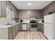Well-equipped kitchen featuring modern appliances, ample counter space, and natural lighting at 257 Browning Cir, Acworth, GA 30101