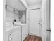 A well-lit laundry room equipped with a modern washer and dryer at 257 Browning Cir, Acworth, GA 30101