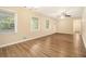Bright living room features hardwood floors, multiple windows, and a ceiling fan for comfortable living at 3500 Finesse Dr, Decatur, GA 30032