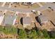 Bird's eye view of the home, fenced yard, and neighborhood, highlighting the property's location at 4150 Spring Ridge Dr, Cumming, GA 30028