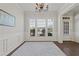 Bright living room with large windows, hardwood floors, and elegant decor at 4150 Spring Ridge Dr, Cumming, GA 30028