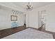 Bright living room with large windows, hardwood floors, and elegant decor at 4150 Spring Ridge Dr, Cumming, GA 30028