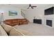 Comfortable living room with a fireplace and a mounted television at 4150 Spring Ridge Dr, Cumming, GA 30028