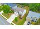 Beautiful aerial view of a well-manicured home with a long driveway and mature trees at 1026 Towne Mill Xing, Canton, GA 30114