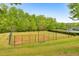 Baseball field with backstop and green outfield at 1026 Towne Mill Xing, Canton, GA 30114