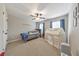 Cozy bedroom featuring carpeting, natural light, and space for sleep and play at 1026 Towne Mill Xing, Canton, GA 30114