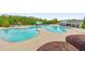 A large community pool that has a kiddie pool and slide at 1026 Towne Mill Xing, Canton, GA 30114