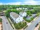 Aerial view of townhomes with lush landscaping, trees, and parking area at 215 Arizona Ne Ave # 6, Atlanta, GA 30307