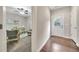 Hallway view into a bedroom featuring a wooden desk and area rug at 215 Arizona Ne Ave # 6, Atlanta, GA 30307