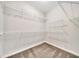 Walk-in closet features carpeted floor and wire shelving for optimal storage and organization at 215 Arizona Ne Ave # 6, Atlanta, GA 30307
